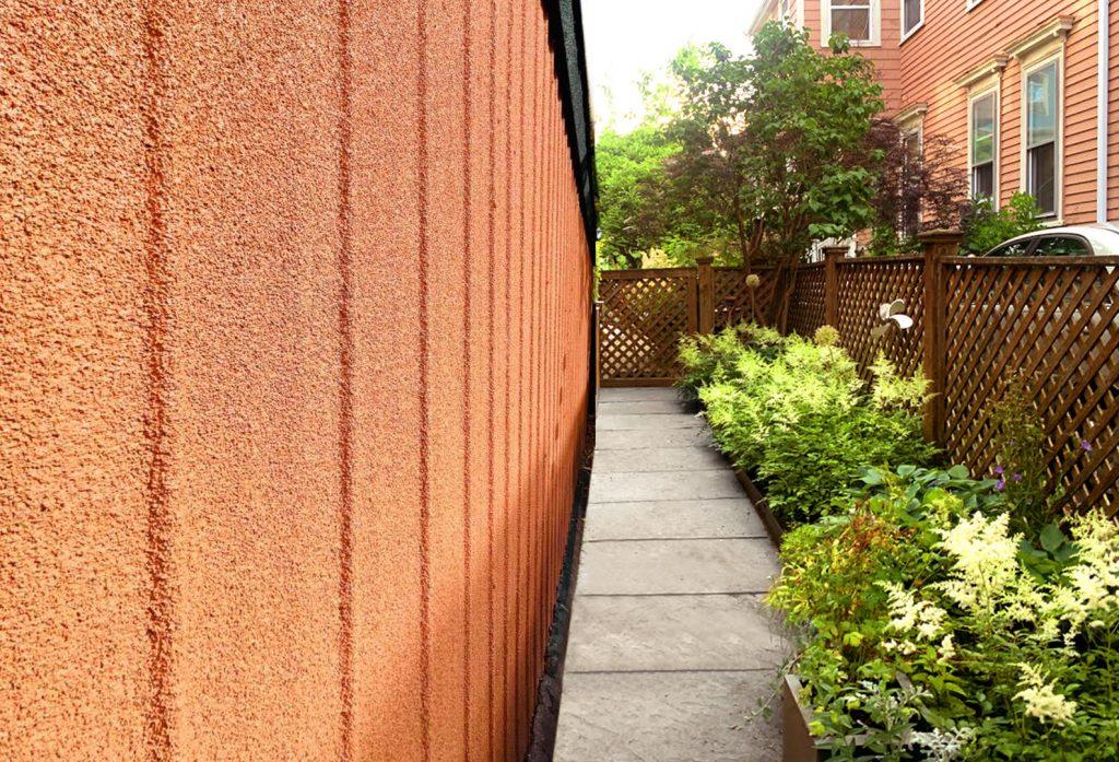 CorkShield over brick before and after - breathable cork spray Tangerine Thermal CorkShield on metal building