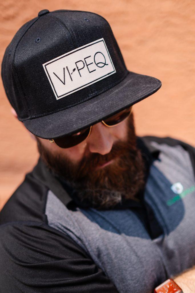 CorkShield over brick before and after - breathable cork spray Tangerine Thermal CorkShield on metal building burgundy cork on stucco Vipeq hat - legacy logo